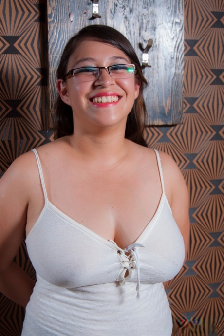 Before unleashing their massive natural tits, Chubby amateur takes off her glasses.