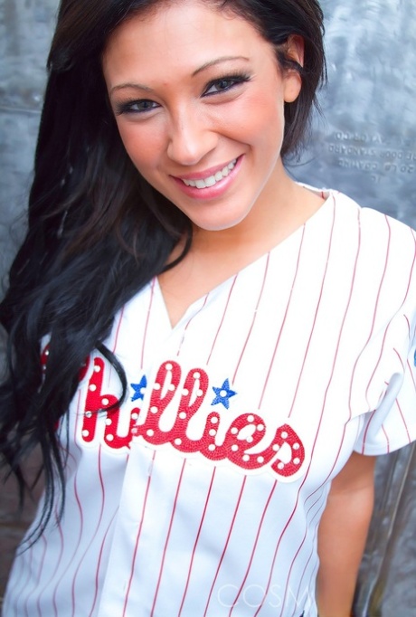 In a thong, Trinity Vaughn, a dark-haired amateur, releases her big tits.