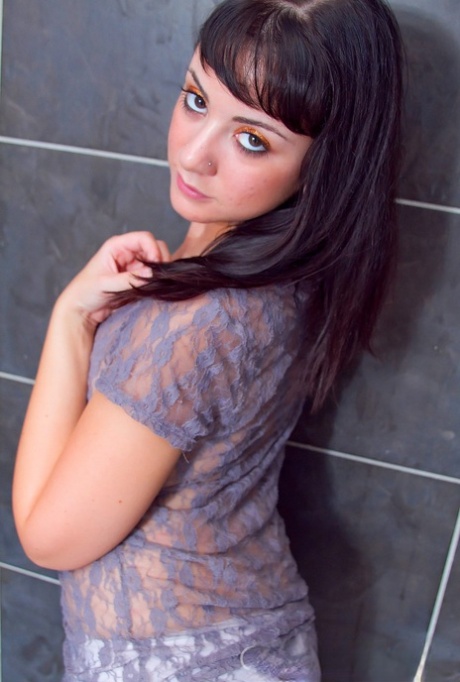 Shower without clothes: Brunette solo girl Chibi Emi makes her first appearance in the nude.