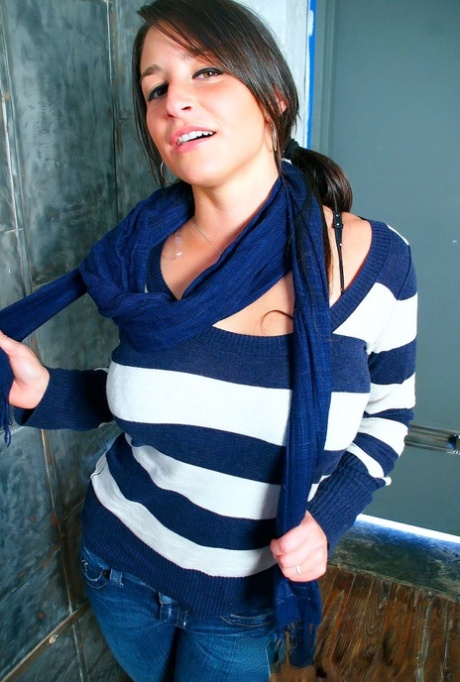 Wearing a black bra and panty, Christine is an amateur model.