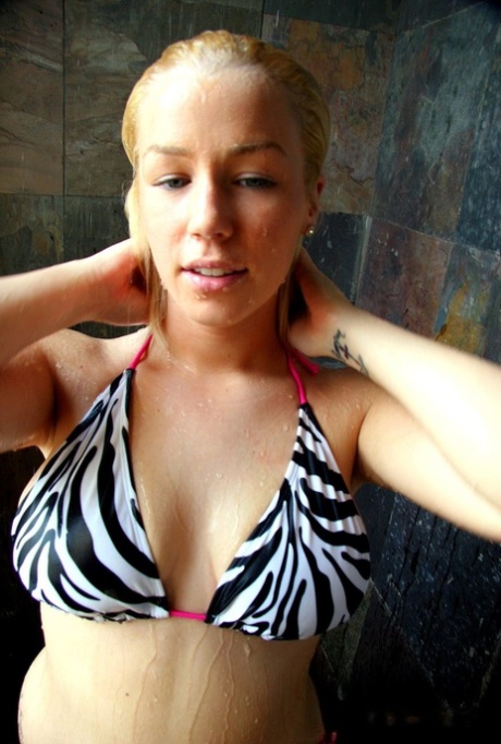 Blonde Amateur Leeann Looses Her Natural Tits From A Bikini Top In A Shower