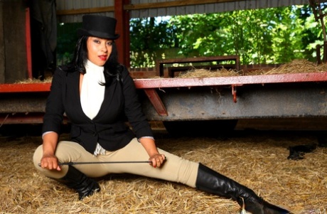 At a farm, Danica Collins is free from riding clothes while being a hot MILF.