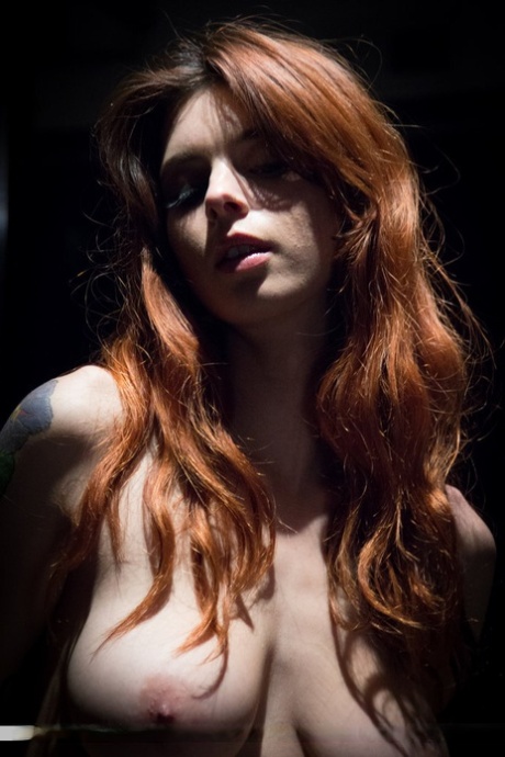 Sexy Redhead Azura Starr Gets Naked While Sitting At Her Drum Kit