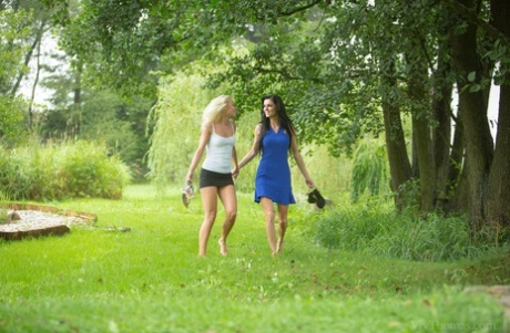 Teen lesbians Eileen Sue & Naomi Nevena finger fuck after a barefoot stroll