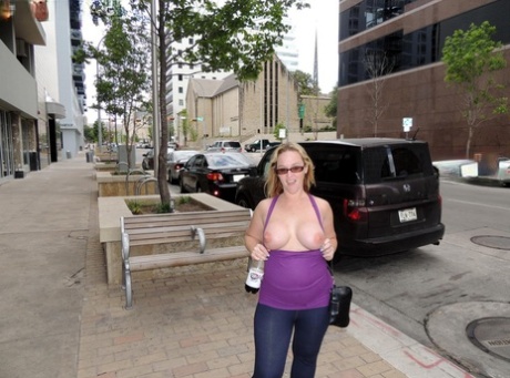 A fat lady named Dee Siren exposes her stomach and antlers in public before being fingered.