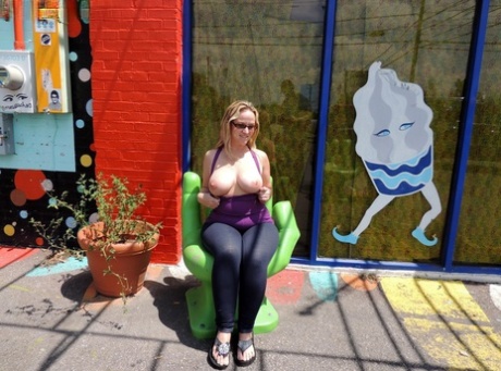 Exposed: This image shows fat lady Dee Siren naked in her tits and ass in public just before she was fingering her own man.