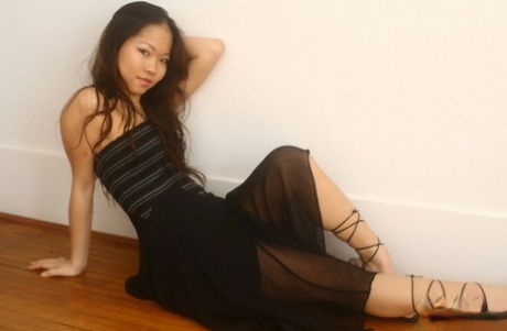 Asian Amateur Grace Shows Her Bare Legs With Her Long Skirt Hitched Up