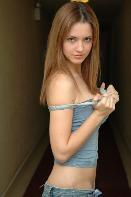 Young Amateur Model Poses Non Nude In Blue Jeans And A Tank Top
