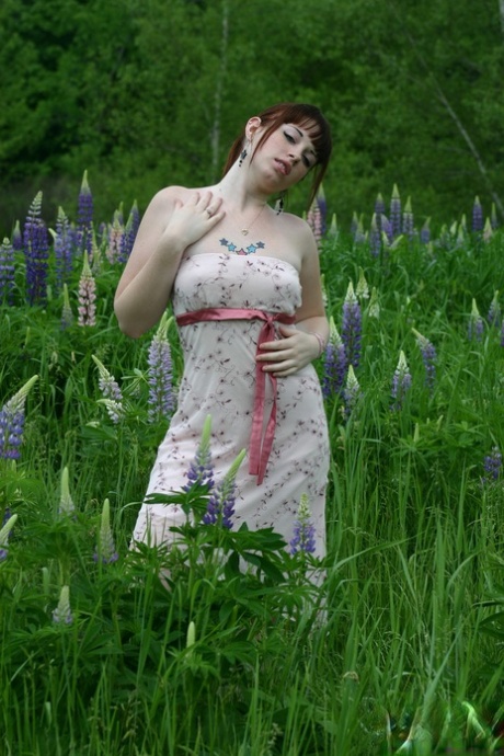 Young Amateur Cutie B4rbi3 Lifts Her Sundress To Show Her Round Ass In A Field