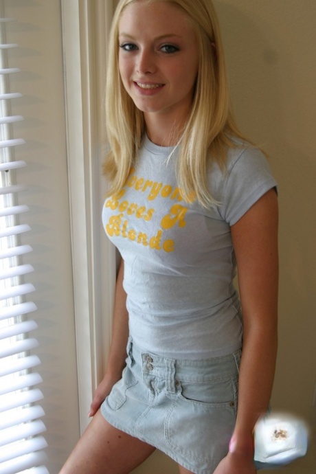 Blonde Amateur Skye Model Models By Herself In A Short Skirt