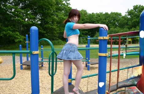 As she plays with her friends, Barbie displays her perky tits on the playground.