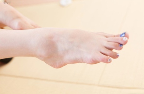 Japanese Woman Exposes Her Feet With Blue Nail Polish While Masturbating