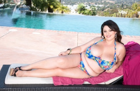 BBW Rose Blush Sets Her Massive Breasts Free While Making A Splash In A Pool