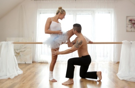 Blonde ballerina Victoria Pure shows off her upper body in white leg warmers by popping a cumshot on the outside.