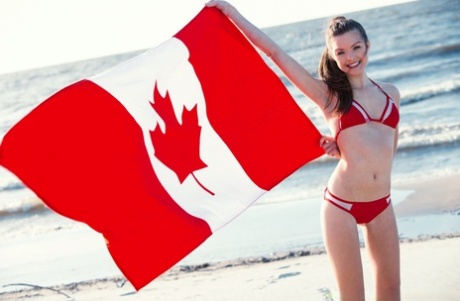 Canadian Girl Michelle Jean Tugs On Her Pigtail After Getting Naked On A Beach