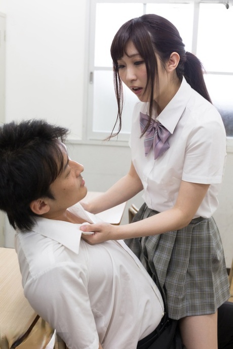 Japanese Schoolgirl Jerks Off Her Teacher's Cock With Her Barefeet