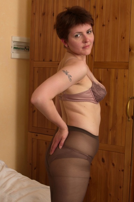 Mature Woman In Pantyhose With Small Saggy Boobs Spreading Her Ass