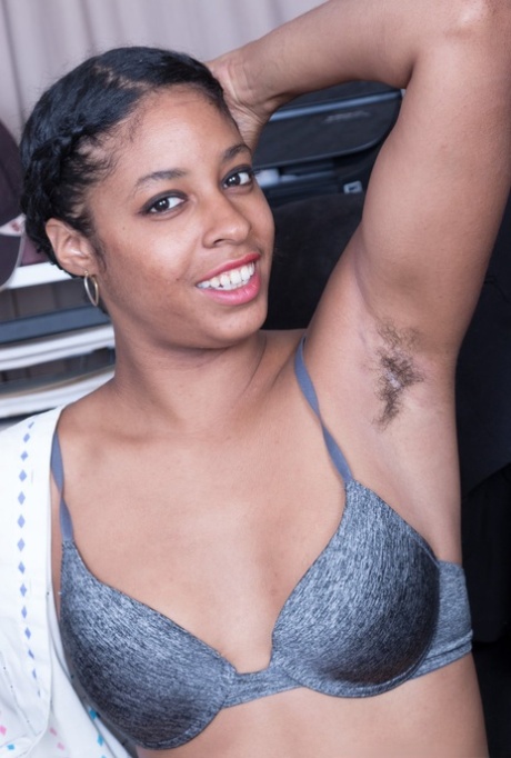 Black amateur Dharma Grace unveils her hairy underarms and vagina