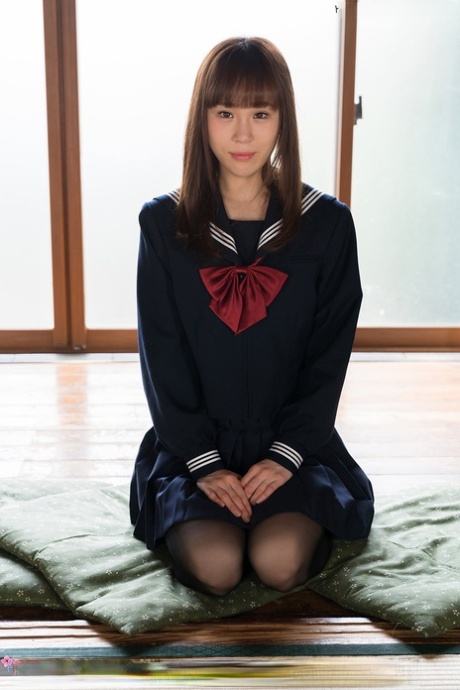 Japanese Student Releases Her Slim Body From Her School Outfit On A Cushion