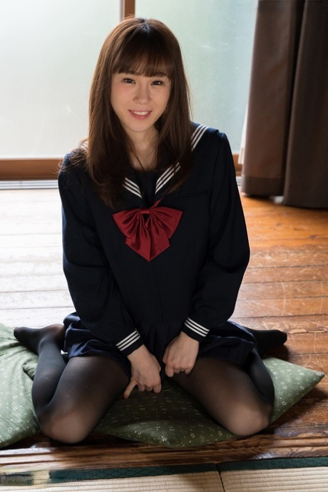 Japanese Student Releases Her Slim Body From Her School Outfit On A Cushion