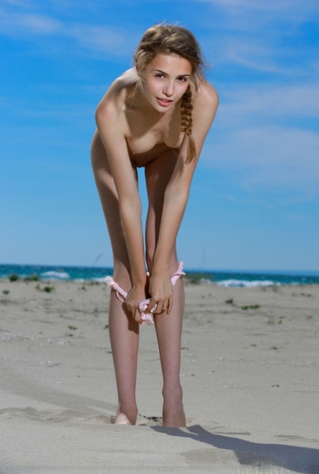 Thin Teen Girl Elle Tan Slips Out Off Her Bathing Suit To Model Nude On Beach