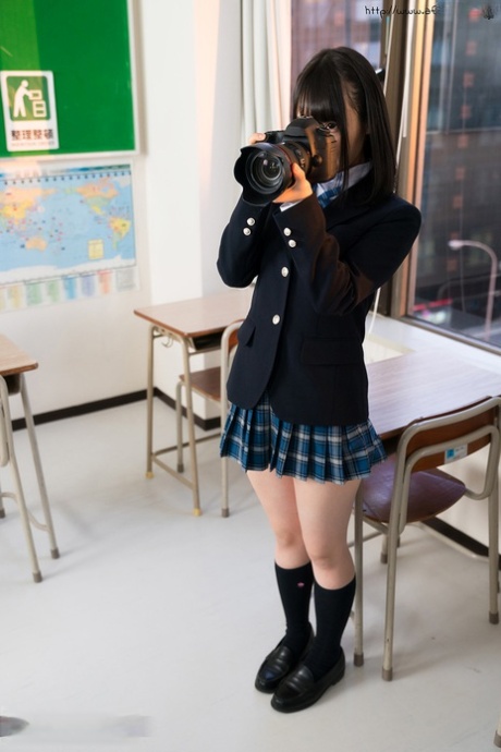 Japanese Schoolgirl Puts Down Her Camera Long Enough To Suck Off Her Teacher