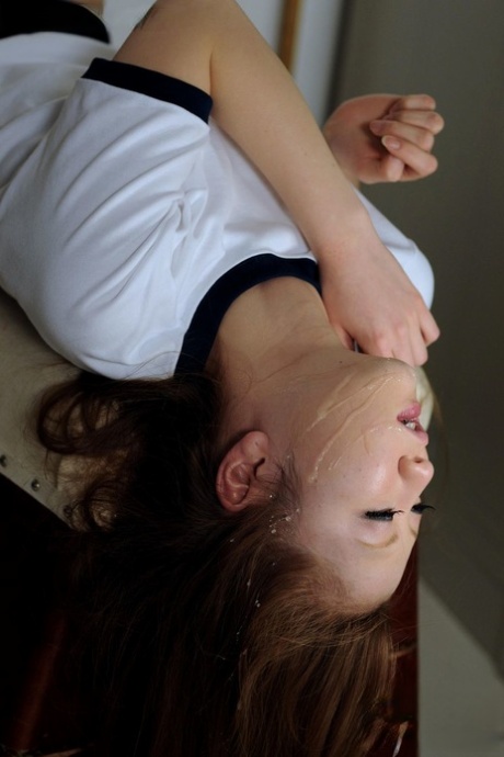 Young and cute Japanese model perform a deep-cranial sex act while being covered in rib cages.