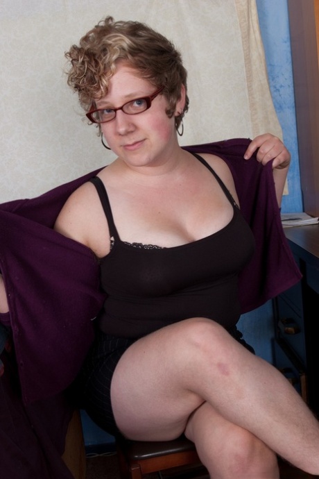 Her saggy tits and hairy pussy are highlighted by the unsightly fatty peeling off her clothes.