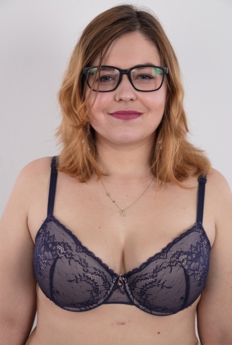 The nude: Karolina, an amateur fatty who is wearing glasses on her face, shows off her flab in the nude.