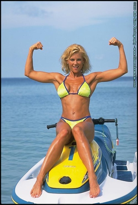 Blonde Fitness Model Stephanie Metzdorf Flexes In A Bikini On A Jet Ski
