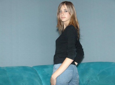 Amateur Solo Girl In Bare Feet And Jeans Starts To Remove Her Sweater