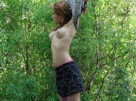 For her first time stripping, Liza is seen in the distance on an air mattress that was surrounded by trees.