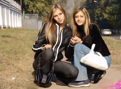 Lesbian teens who display small tits and intimately touch their nipples in public on campus.