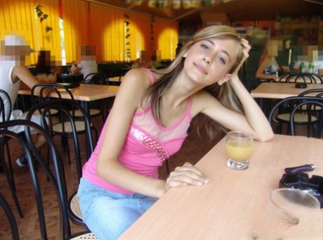 Dirty blonde teen flashes a no panty upskirt inside a restaurant