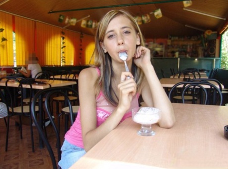 Dirty blonde teen flashes a no panty upskirt inside a restaurant