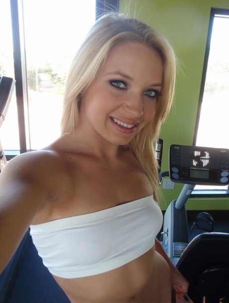 Alyssa, a blonde amateur, uploads nude and non-nude selfies for her dating profile.