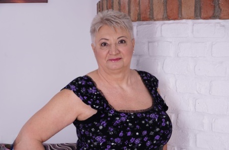 With a short haircut, the overweight nan has been having sex with her young lover.