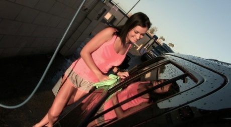 Nadia Capri flirts with a guy at the local car wash.