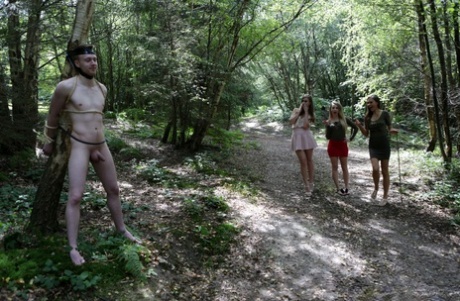 College Girls Find A Man Tied To A Tree In The Woods And Suck His Naked Dick