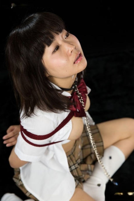 Japanese Student Is Restrained While Being Mouth Fucked On Her Knees