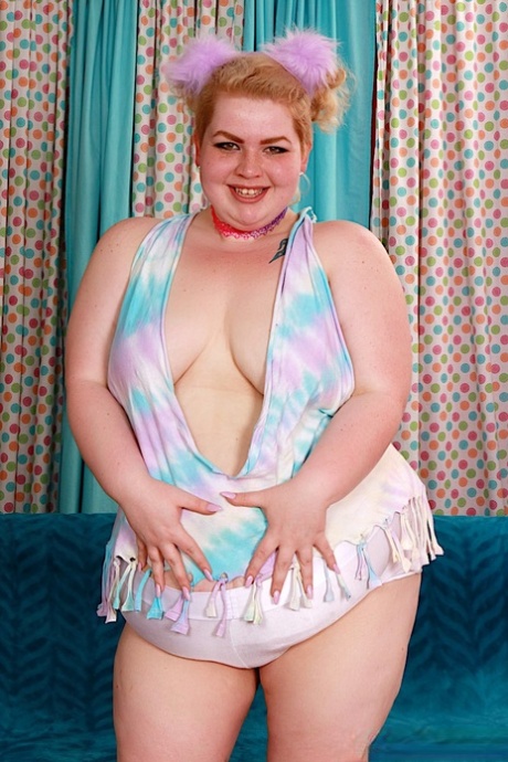 SSBBW Velma Voodoo wears her hair up in puffs while parting her pussy