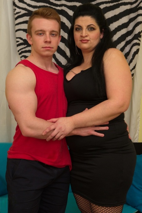 Bigboobs: The black haired, overweight housewife has his big boobs played with by her toy boy.