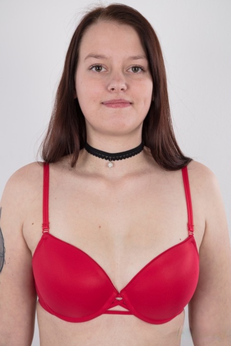 In her nude premiere, Katka, an amateur girl, is seen wearing a black choker and standing naked.