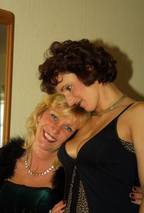 When they are in the motel room, mature dykes engage in playful mawsing while kissing each other in their nylons.