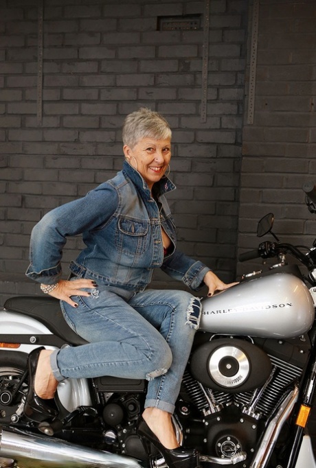 Old-fashioned Savana models in lingerie on a Harley Davidson motorcycle.