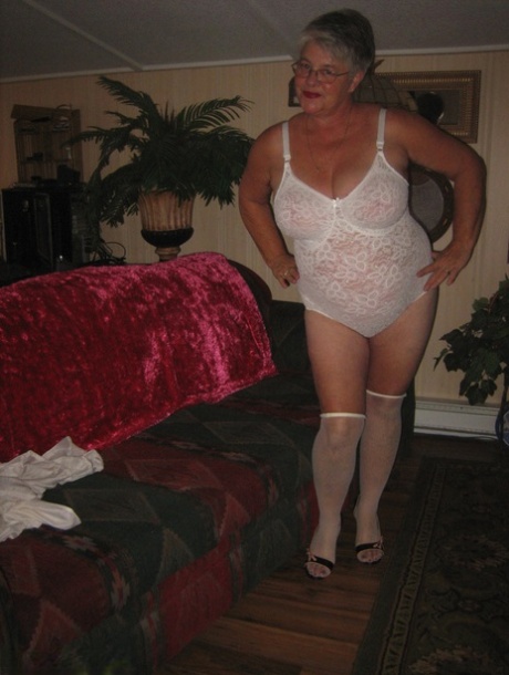 Rather, Obese granny removes her layers of lace and dresses in OTK nylon shorts to model without clothes on.