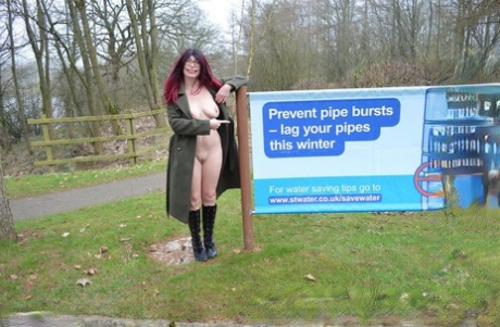 Exotic barbecus with mature red hair, BarbySlut is seen naked outside wearing only a coat and boots.