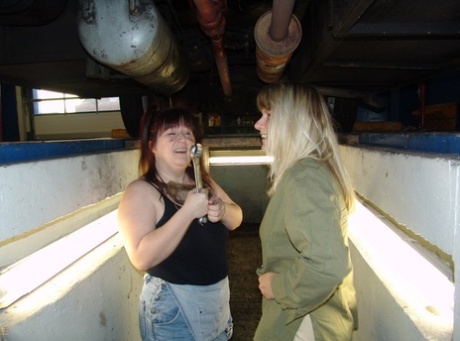 While in a pit, Sweet Susi and her partner play fetch together while holding hands.