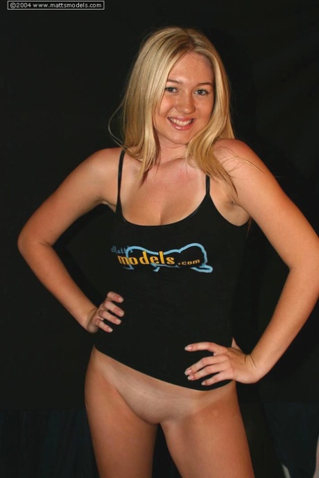 Alison, a blonde girl, embraces her girlfriend after modeling in the nude.