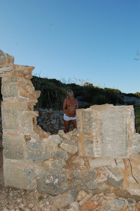 The naked poses are taken by the adult Sweet Susi on a construction site, where she is still in her prime.